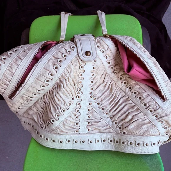 Ivory Isabella Fiore ruched brass grommets studded large leather hobo bag

- - Picture 5 of 16